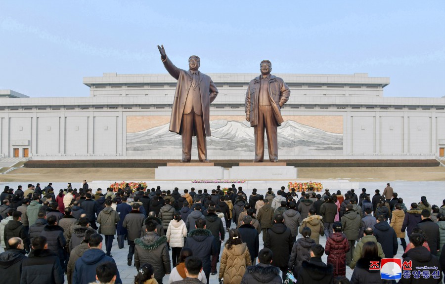 Floral Tribute Paid to Statues of President Kim Il Sung and Chairman Kim Jong Il