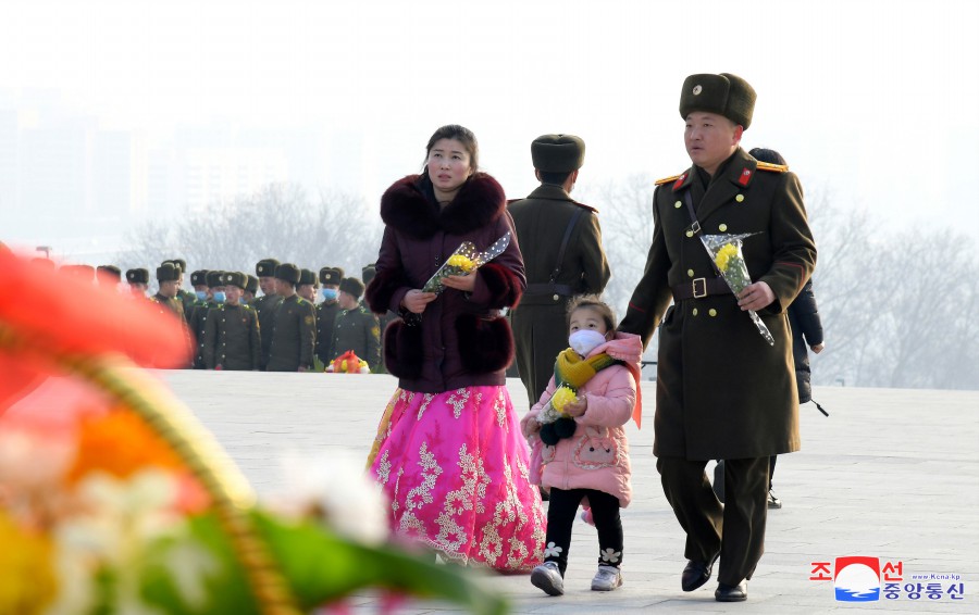 Floral Tribute Paid to Statues of President Kim Il Sung and Chairman Kim Jong Il