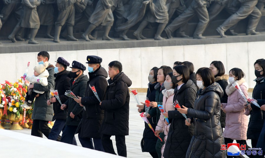 Floral Tribute Paid to Statues of President Kim Il Sung and Chairman Kim Jong Il