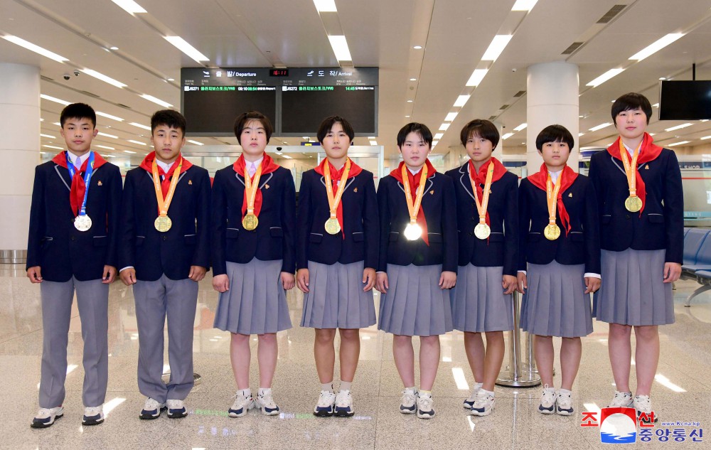 DPRK Players Return Home