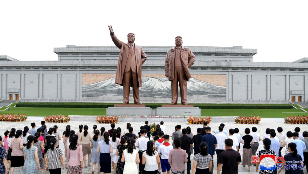 Floral Tribute Paid to Statues of Great Leaders