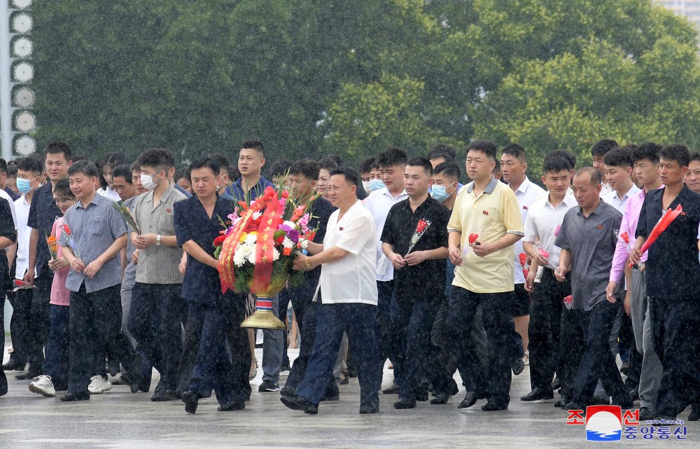 Floral Tribute Paid to Statues of Great Leaders