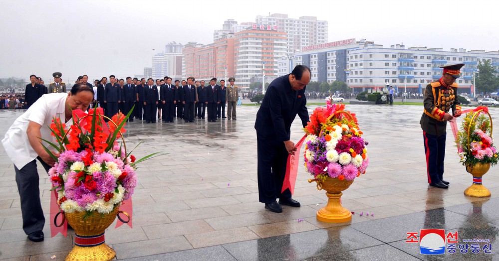 Floral Tribute Paid to Statues of Great Leaders