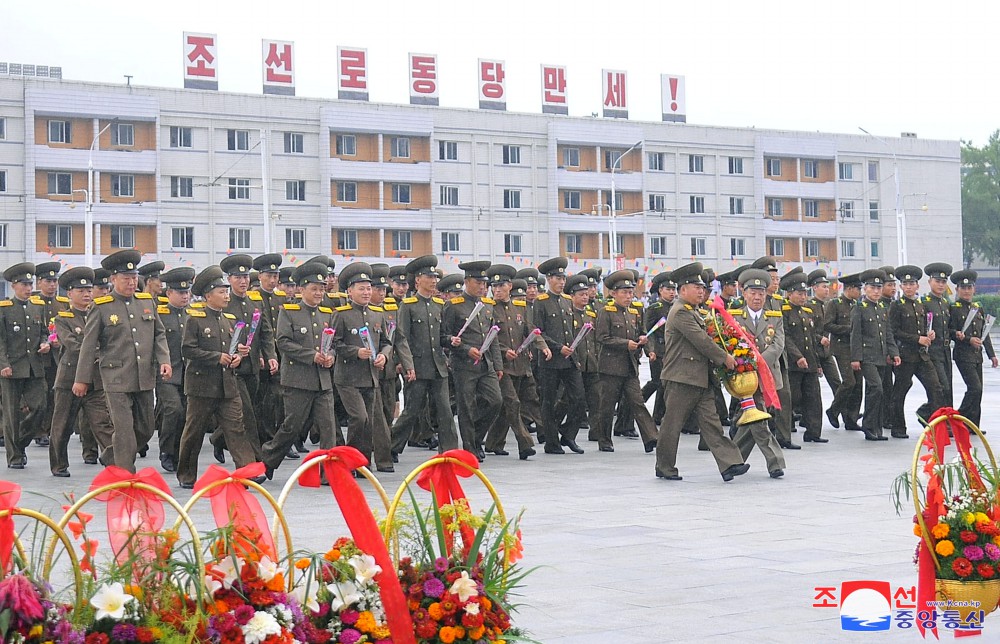 Floral Tribute Paid to Statues of Great Leaders