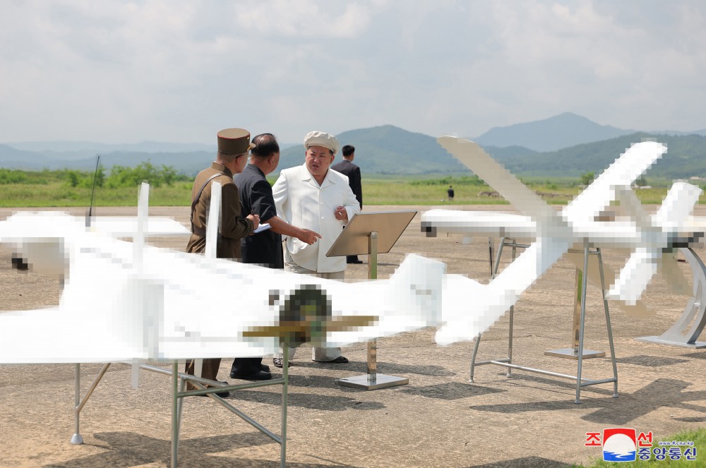 Respected Comrade Kim Jong Un Oversees Performance Test of Drones