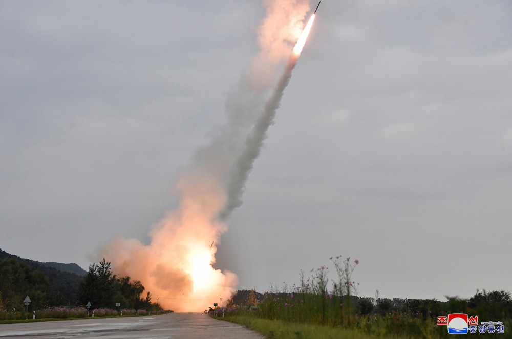 Respected Comrade Kim Jong Un Oversees Test-fire for Verifying Performance of New-type 600mm Multiple Rocket Launcher