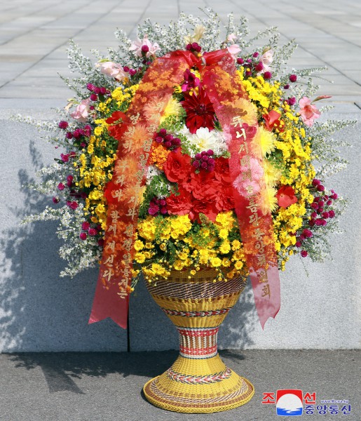 Floral Tribute Paid to Statues of Great Leaders