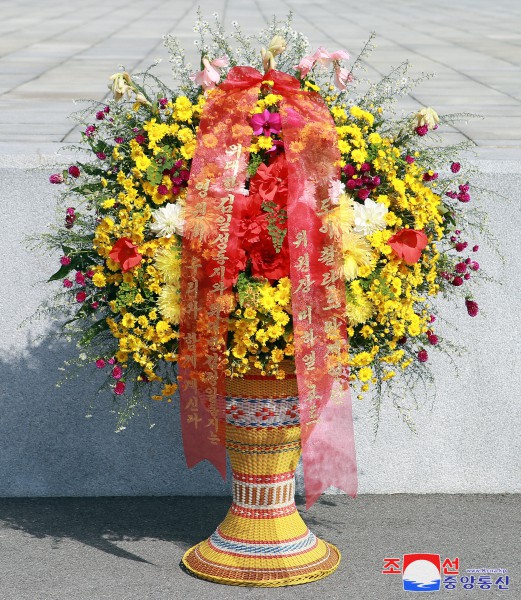 Floral Tribute Paid to Statues of Great Leaders