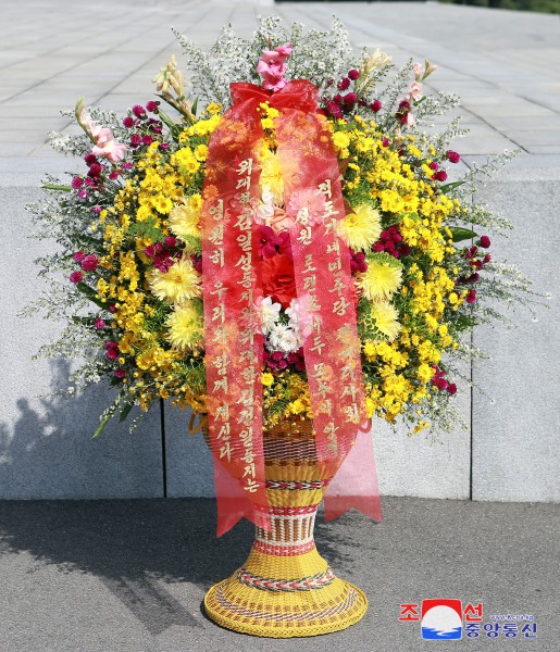 Floral Tribute Paid to Statues of Great Leaders