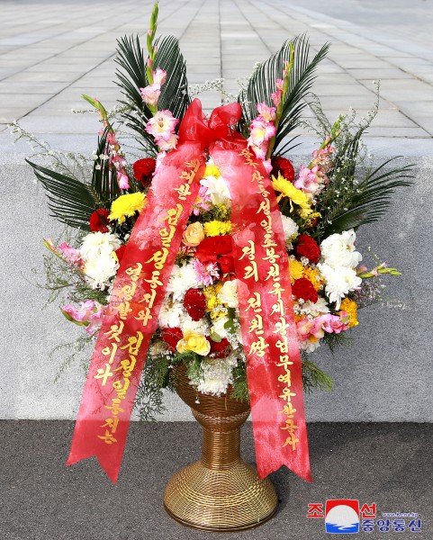 Floral Tribute Paid to Statues of Great Leaders