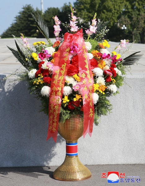 Floral Tribute Paid to Statues of Great Leaders