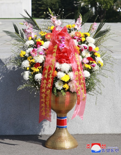 Floral Tribute Paid to Statues of Great Leaders