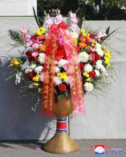 Floral Tribute Paid to Statues of Great Leaders