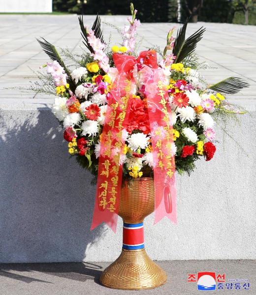 Floral Tribute Paid to Statues of Great Leaders