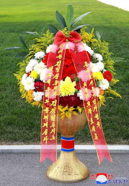 Floral Tribute Paid to Statues of Great Leaders