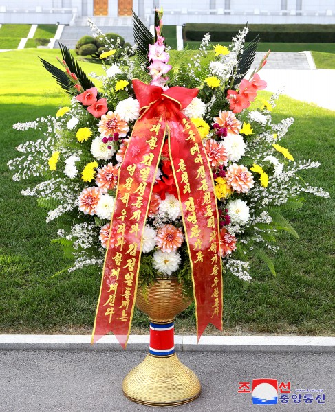 Floral Tribute Paid to Statues of Great Leaders