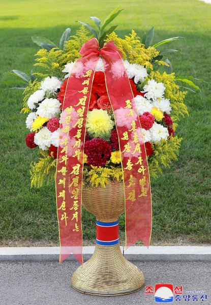 Floral Tribute Paid to Statues of Great Leaders