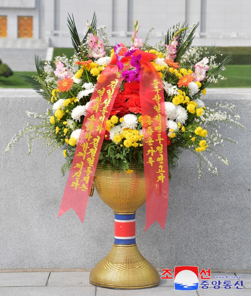 Floral Tribute Paid to Statues of Great Leaders