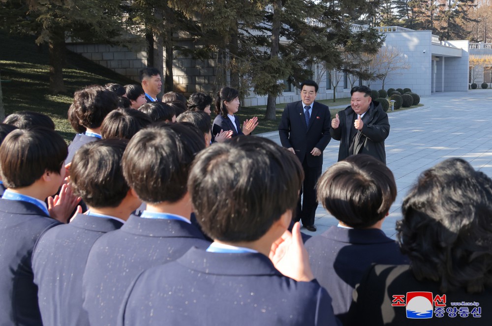 Respected Comrade Kim Jong Un Has Photo Taken with Labour Innovators and Persons of Merit on Occasion of New Year 2025