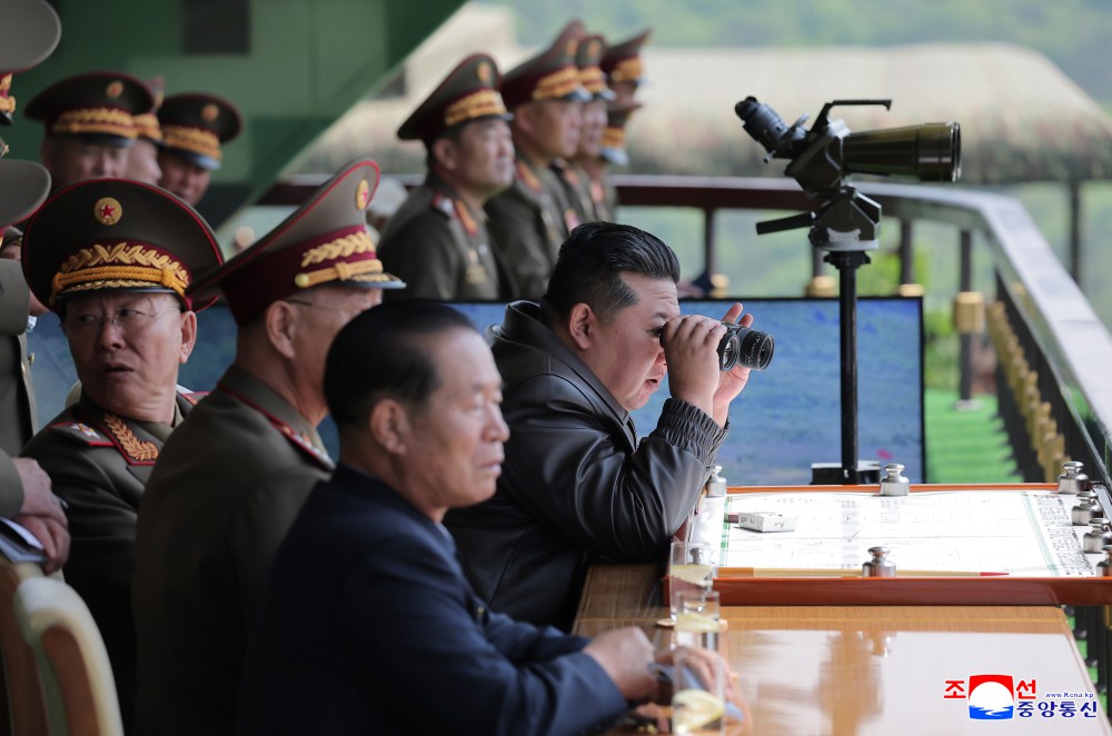 Respected Comrade Kim Jong Un Inspects Combined Tactical Drill of Different Arms Conducted under Training Course of Conference of Training Officers of KPA