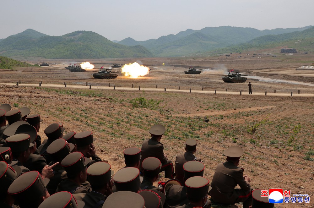 Respected Comrade Kim Jong Un Inspects Combined Tactical Drill of Different Arms Conducted under Training Course of Conference of Training Officers of KPA