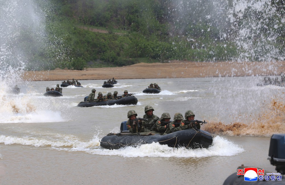 Respected Comrade Kim Jong Un Inspects Combined Tactical Drill of Different Arms Conducted under Training Course of Conference of Training Officers of KPA