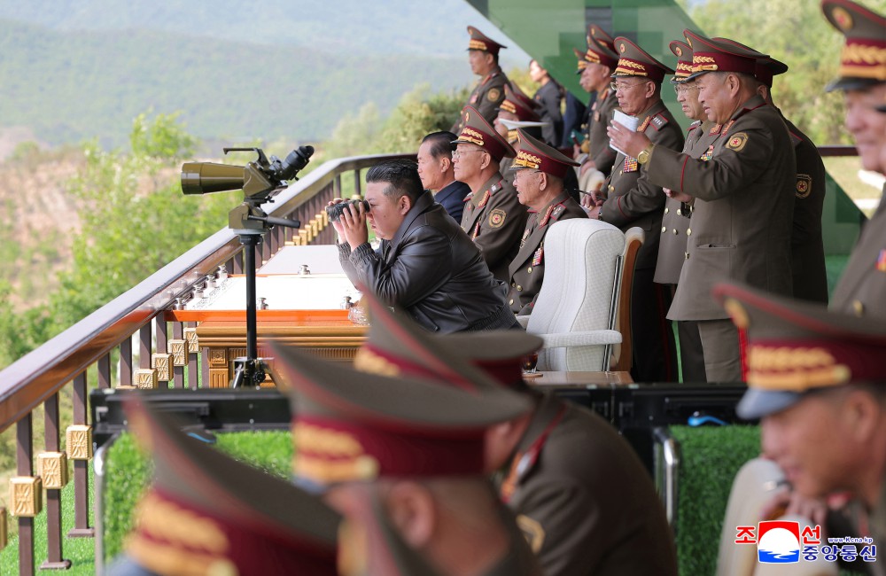 Respected Comrade Kim Jong Un Inspects Combined Tactical Drill of Different Arms Conducted under Training Course of Conference of Training Officers of KPA