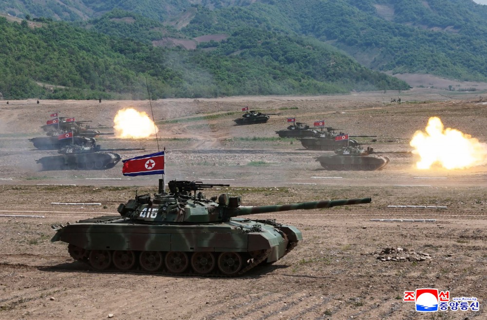 Respected Comrade Kim Jong Un Inspects Combined Tactical Drill of Different Arms Conducted under Training Course of Conference of Training Officers of KPA
