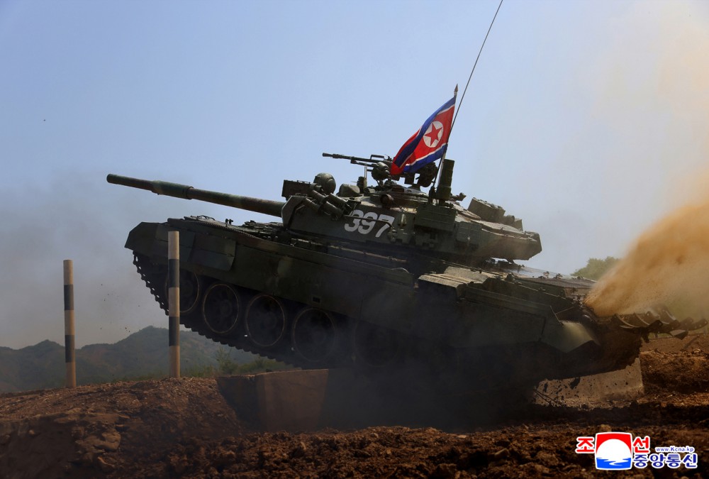 Respected Comrade Kim Jong Un Inspects Combined Tactical Drill of Different Arms Conducted under Training Course of Conference of Training Officers of KPA