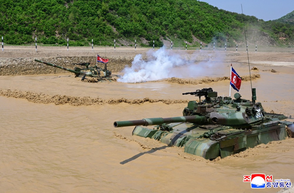 Respected Comrade Kim Jong Un Inspects Combined Tactical Drill of Different Arms Conducted under Training Course of Conference of Training Officers of KPA