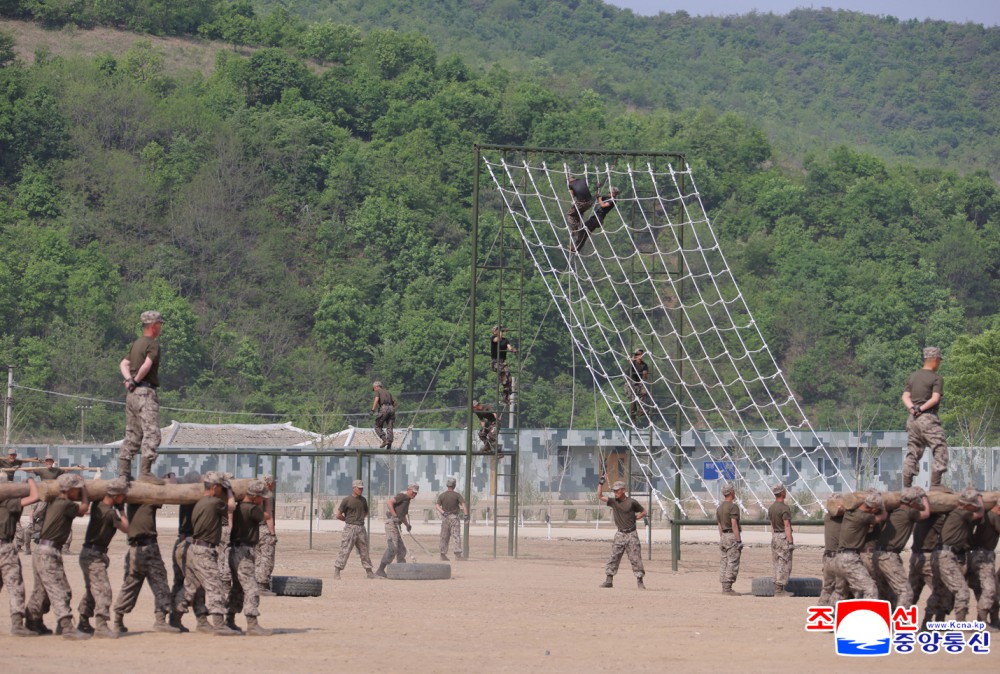 Respected Comrade Kim Jong Un Inspects Combined Tactical Drill of Different Arms Conducted under Training Course of Conference of Training Officers of KPA