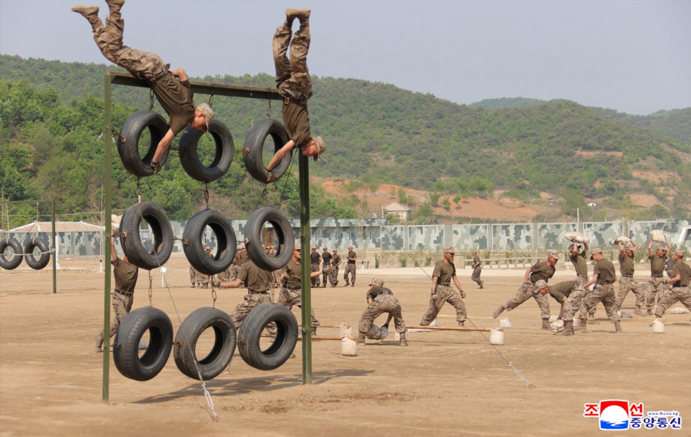 Respected Comrade Kim Jong Un Inspects Combined Tactical Drill of Different Arms Conducted under Training Course of Conference of Training Officers of KPA