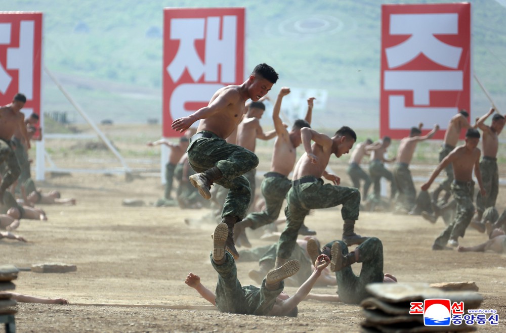 Respected Comrade Kim Jong Un Inspects Combined Tactical Drill of Different Arms Conducted under Training Course of Conference of Training Officers of KPA