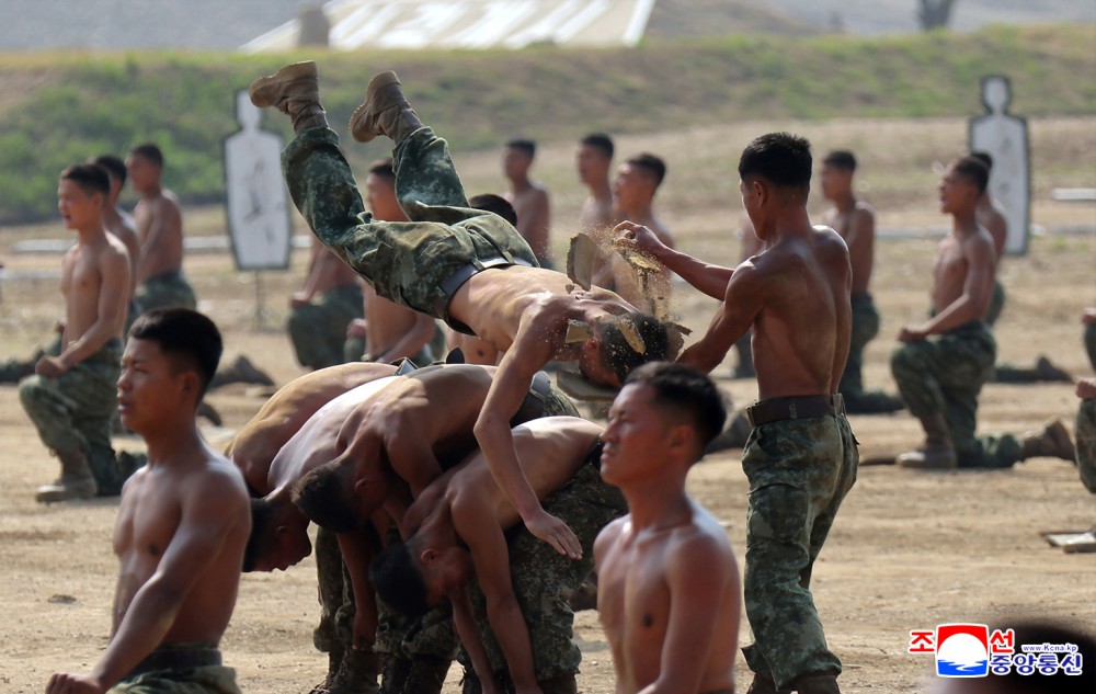 Respected Comrade Kim Jong Un Inspects Combined Tactical Drill of Different Arms Conducted under Training Course of Conference of Training Officers of KPA