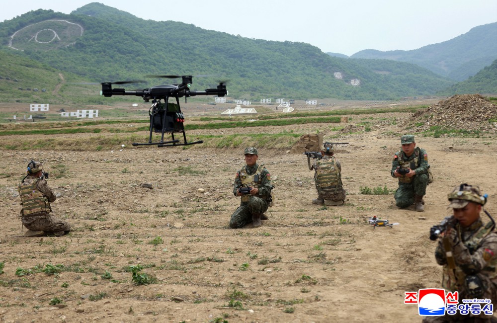 Respected Comrade Kim Jong Un Inspects Combined Tactical Drill of Different Arms Conducted under Training Course of Conference of Training Officers of KPA
