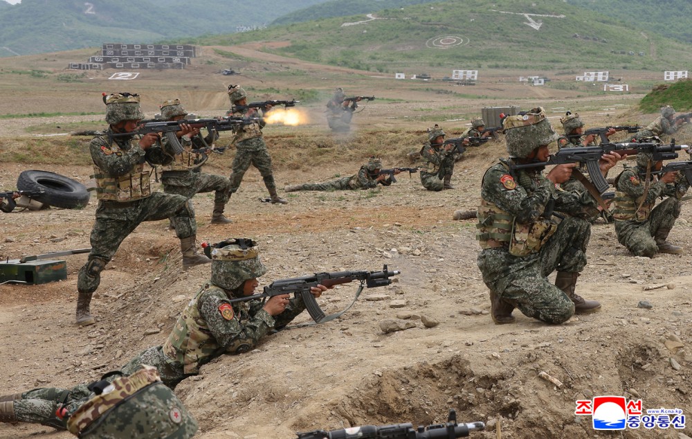 Respected Comrade Kim Jong Un Inspects Combined Tactical Drill of Different Arms Conducted under Training Course of Conference of Training Officers of KPA