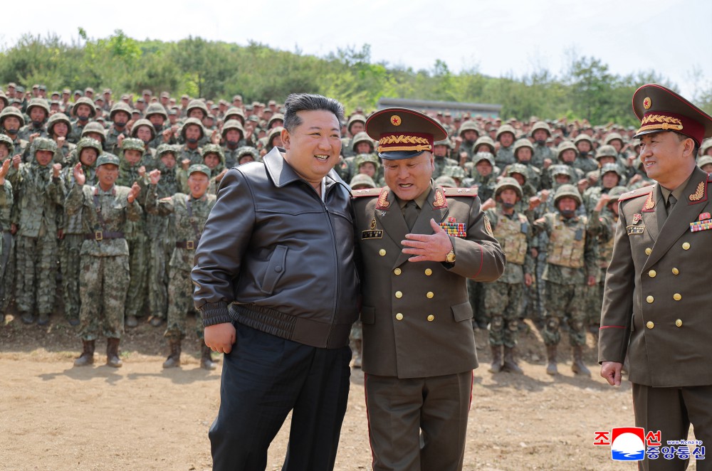 Respected Comrade Kim Jong Un Inspects Combined Tactical Drill of Different Arms Conducted under Training Course of Conference of Training Officers of KPA